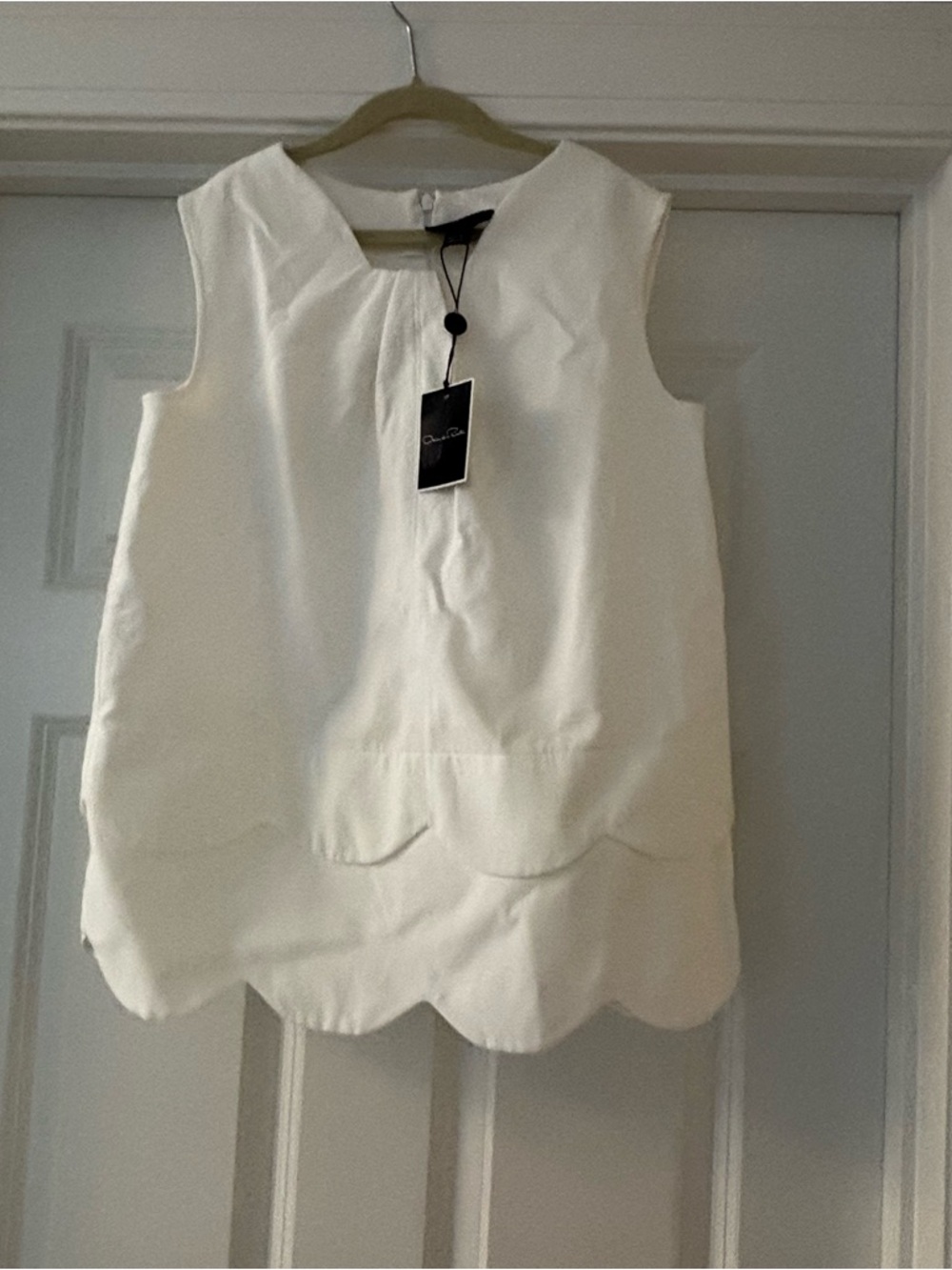 Girls Oscar De La Renta white scallop shift dress, size 12Y. New with tags.